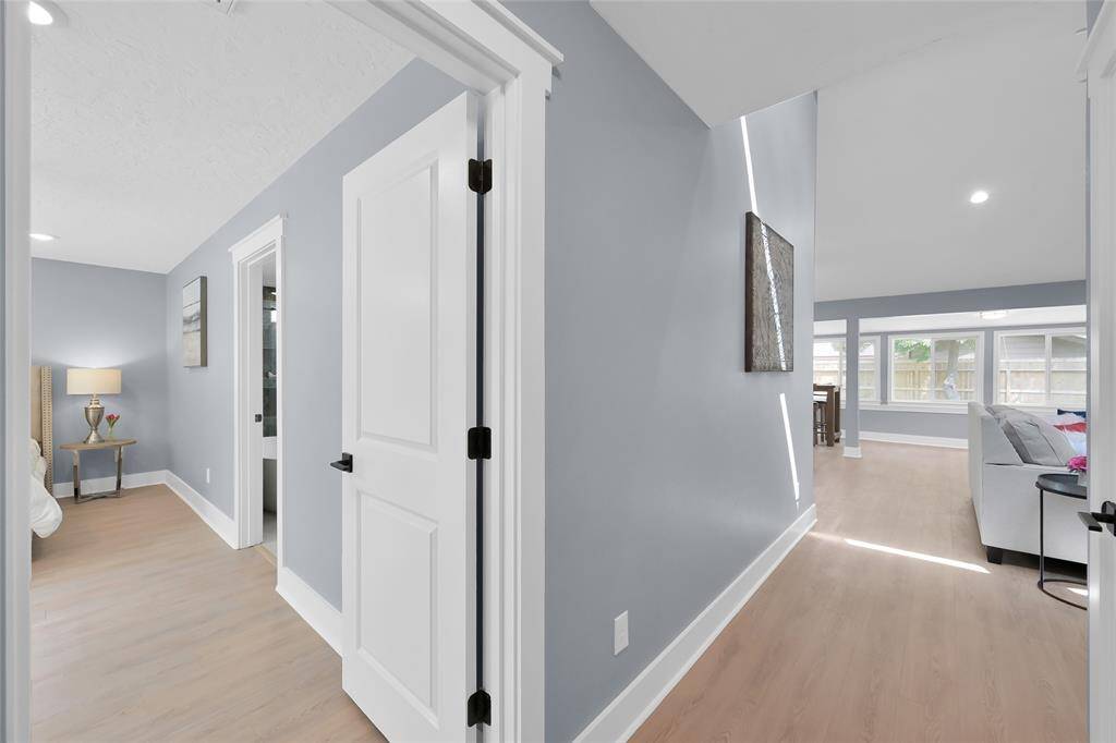 Master bedroom to the left. Living room and kitchen ahead