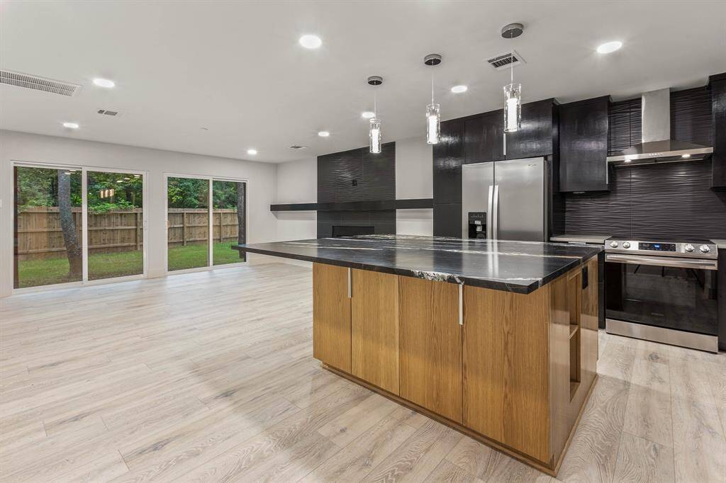 Inside you will be welcomed by a spacious interior, luxury vinyl wood flooring and bright lighting.
