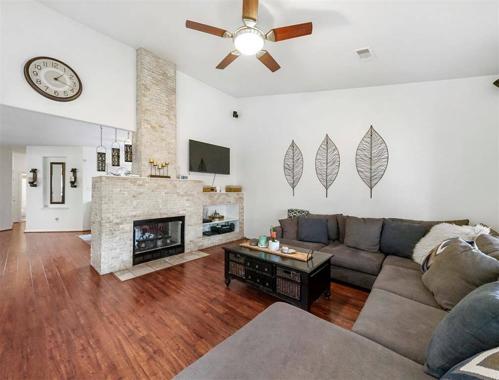 The family room is open and bright and located just off of the kitchen.