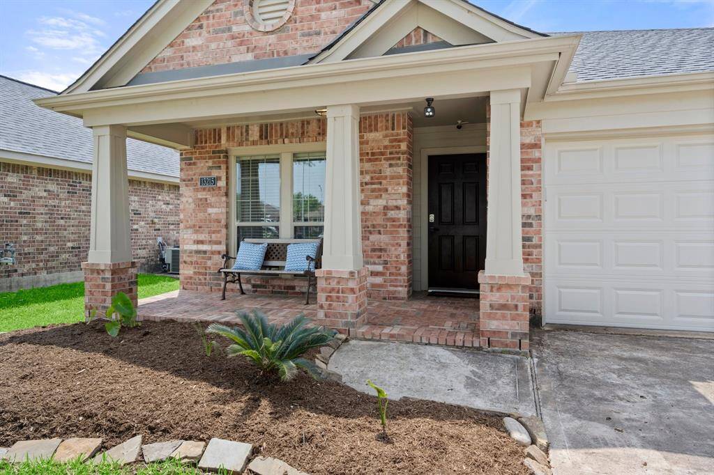 Freshly landscaped front yard with great curb appeal