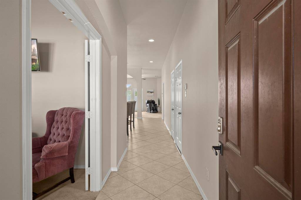 Inviting tiled entryway sets the tone for the home.