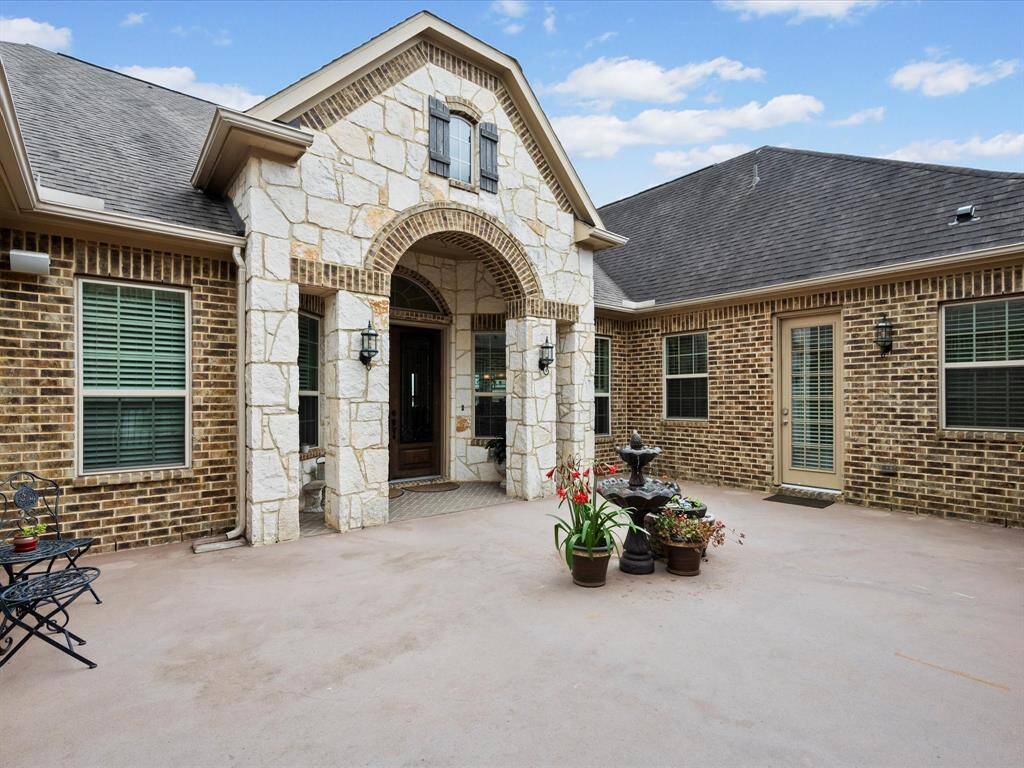 private courtyard w/iron gate to enter