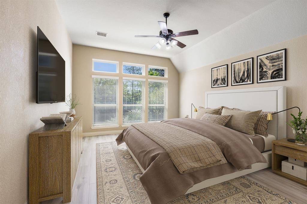 Primary Retreat features newly installed white oak floors and light neutral paint, creating a calm and sophisticated retreat. (VS)