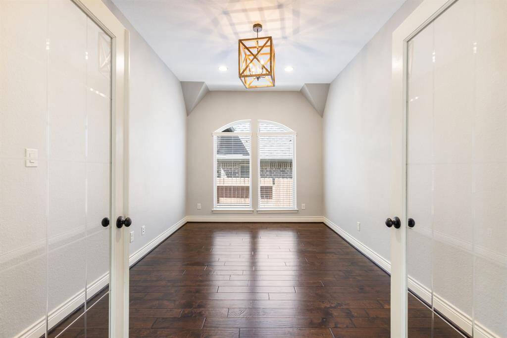Butte glass double doors open into a a handsome study.