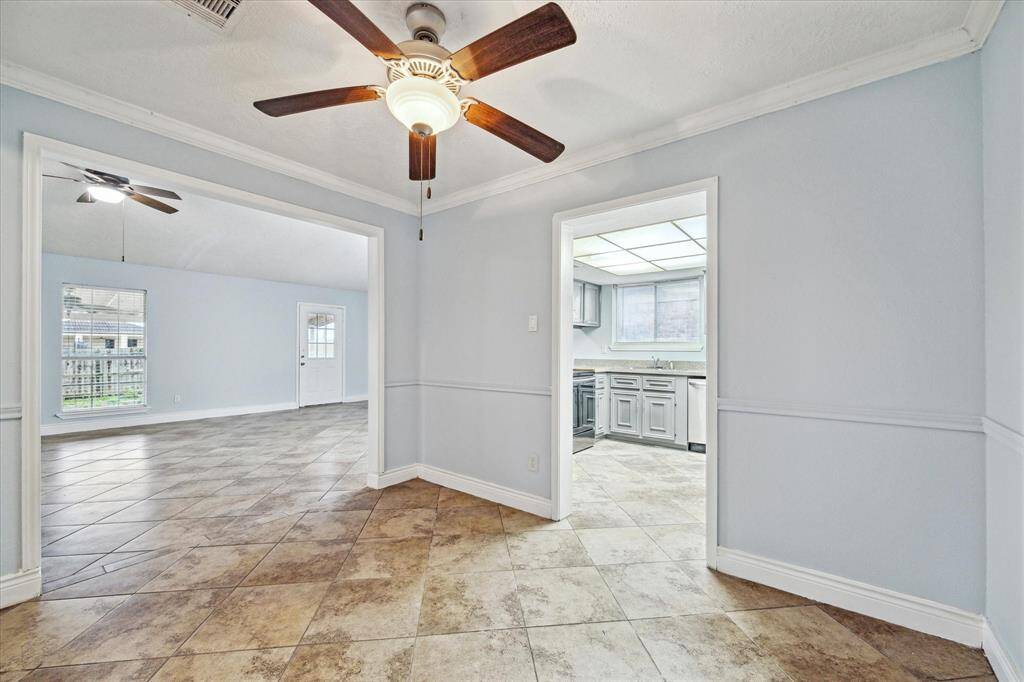 The formal dining area is just off the kitchen and living room.