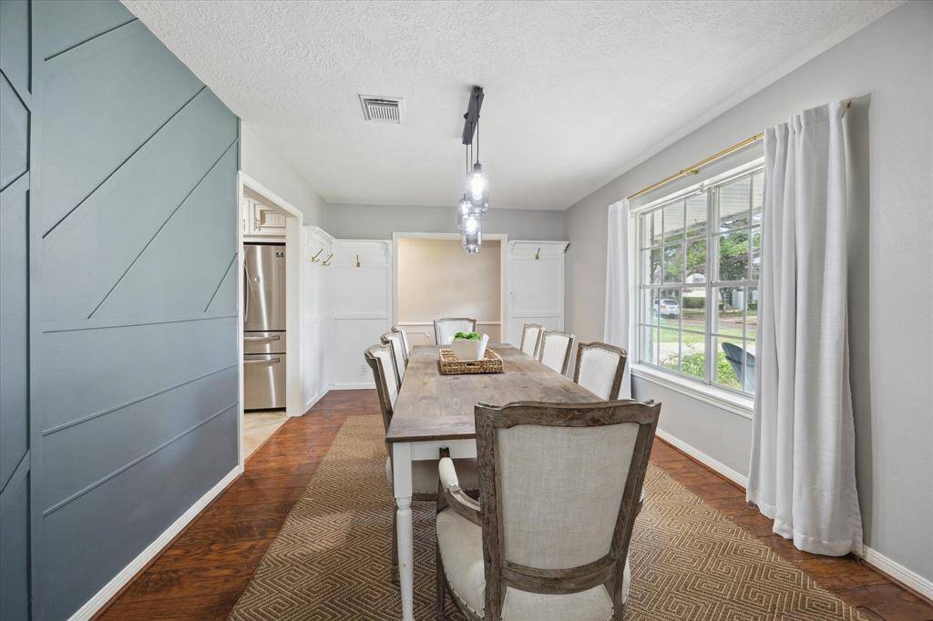 Great flow for entertaining throughout this home, with seamless transitions between the kitchen, dining, and living spaces.