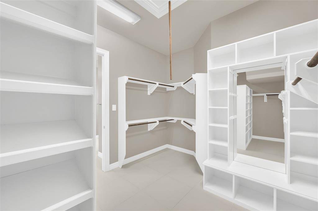 Secondary view of the primary closet.