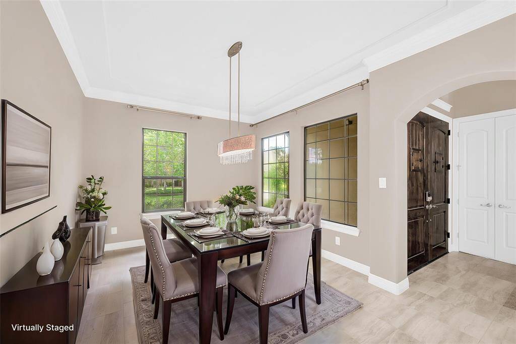 Elegant formal dining room with custom chandelier.
