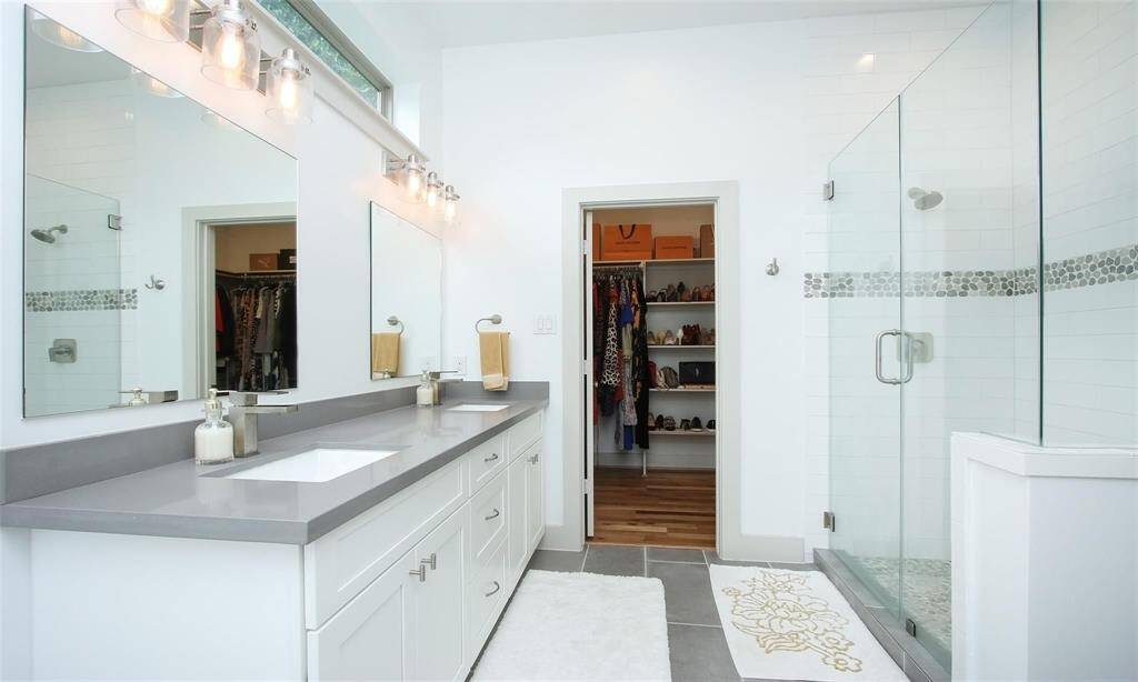 You're very own spa to enjoy every day in this beautiful primary ensuite, leading to a walk-in closet.