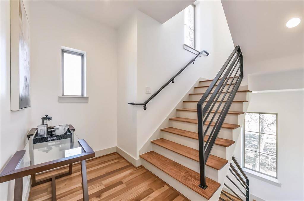 A large third floor landing offers space for a reading nook, office space, or coffee station!!