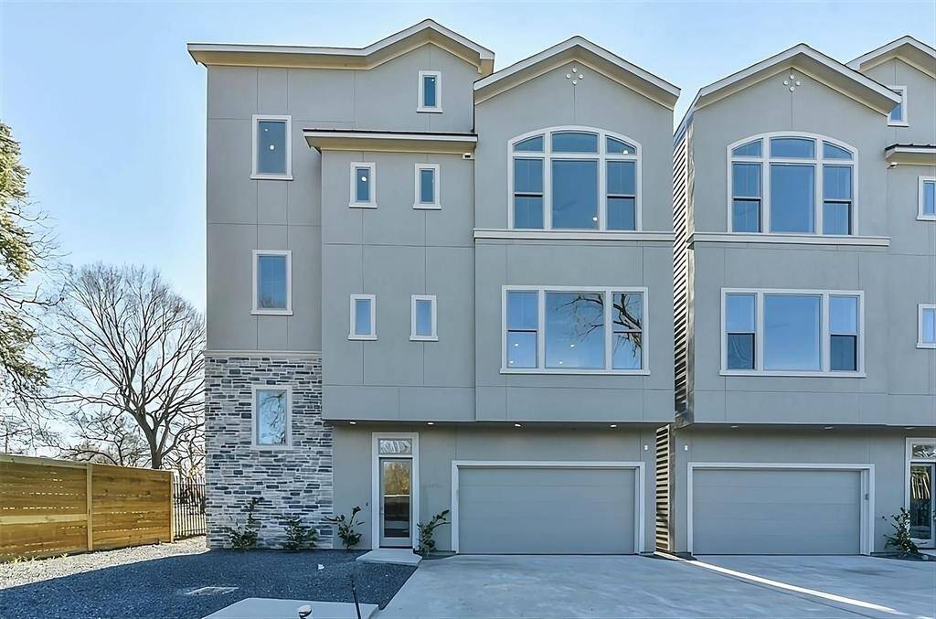 Contemporary & thoughtfully designed home, with fenced side yard & rooftop deck, in the heart of the city.