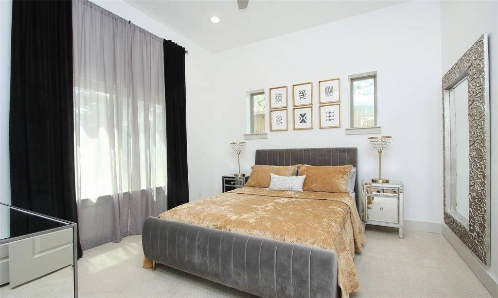 Spacious first floor bedroom with full bath. Perfect for a guest bedroom or home office. Blinds and curtains included.