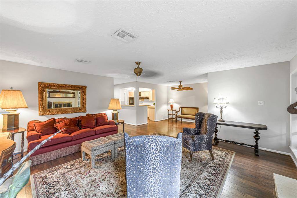 The Family room flows seamlessly into the kitchen & formal dining room, ideal for dinner parties or family meals