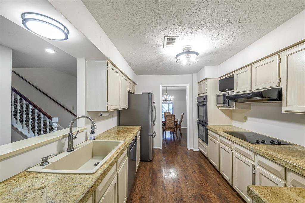 Large kitchen with lots of granite counter space