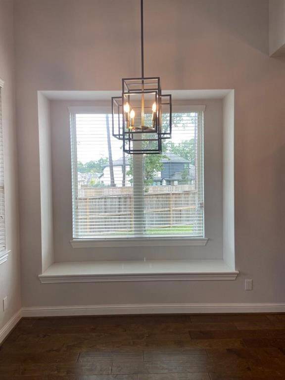 Living room space overlooking the backyard
