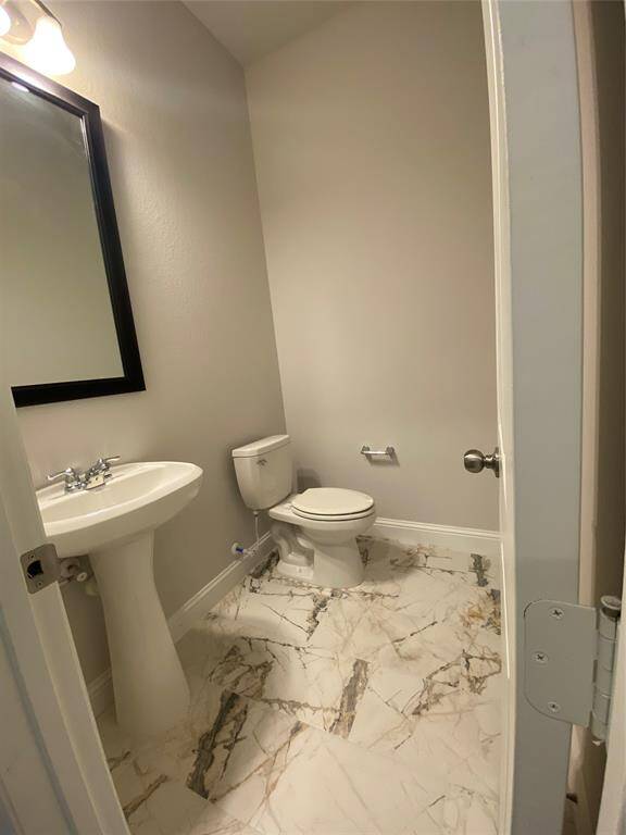 Hall between laundry and exit to garage