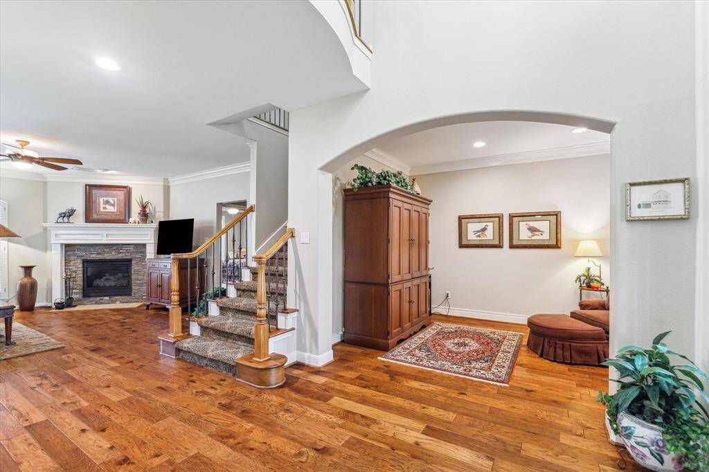This space is currently used as a study. Notice the crown molding extends into this room.