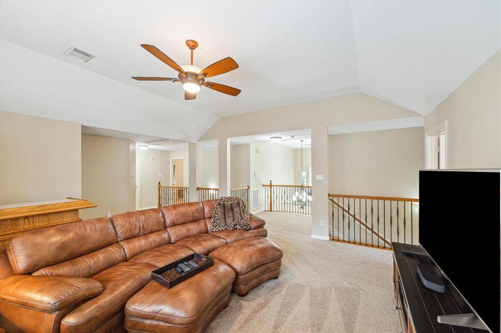 This view is directed toward the front of the house. You can see the Juliet balcony and elegant chandelier that hangs in the foyer.