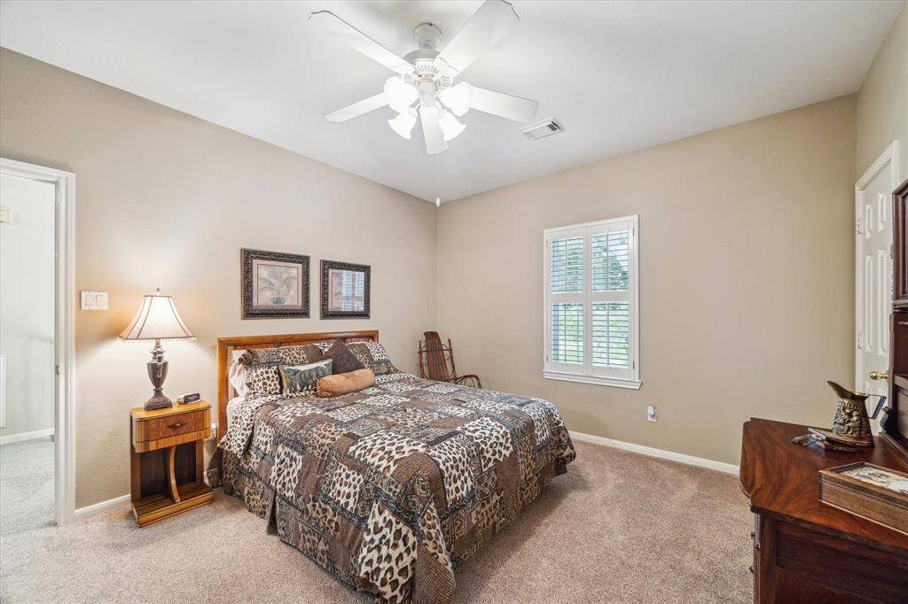 The second of 4 secondary bedrooms. This one has a window in the closet.