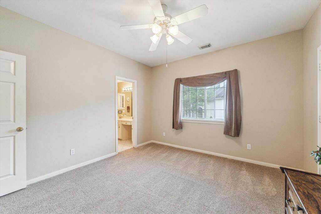 The third of 4 secondary bedrooms. This one is located over the kitchen area. The fourth bedroom is currently being used as a staging area for packing.