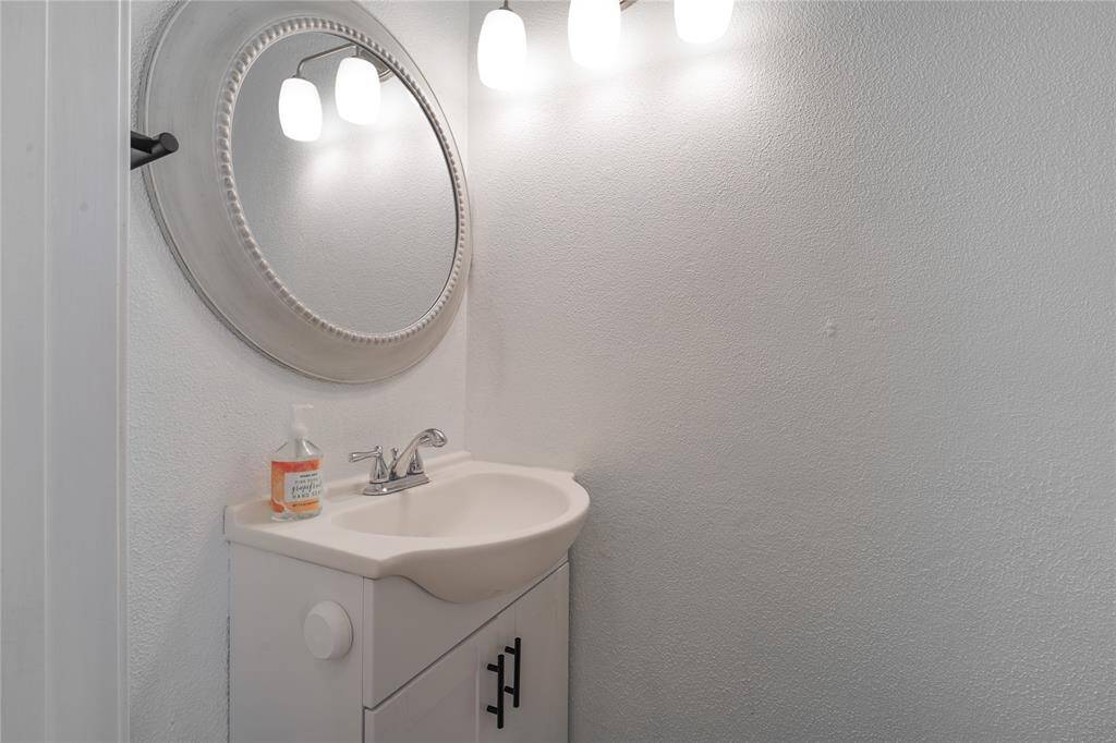 A half bathroom totally renovated in modern style.