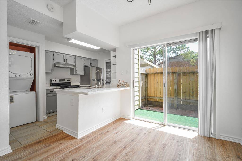 A cozy kitchen with an island offering a functional and stylish cooking space.