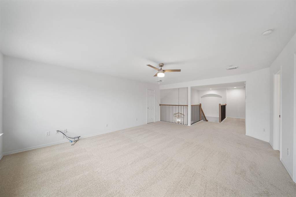 The expansive open layout offers endless possibilities, whether you want to set up a media space, game tables, or a home gym.