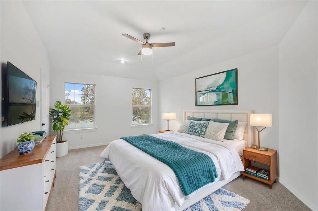 Each bedroom offers a flexible layout, ideal for a guest room, home office, or personal sanctuary.
