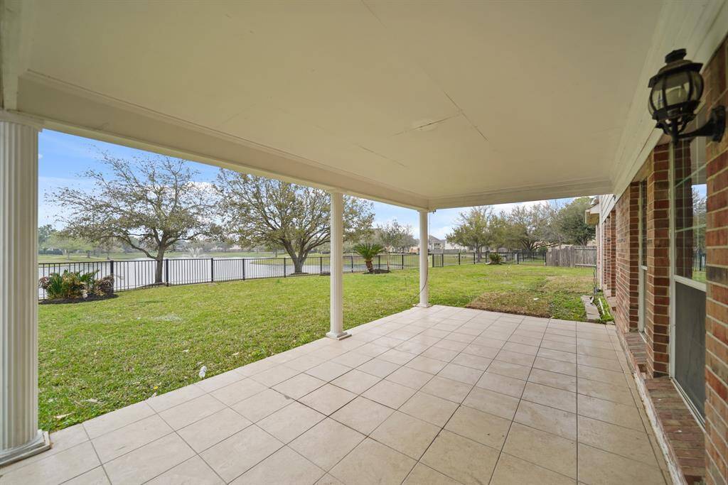 Enjoy outdoor living year-round with a large, covered back patio, perfect for relaxing, entertaining, or dining al fresco.
