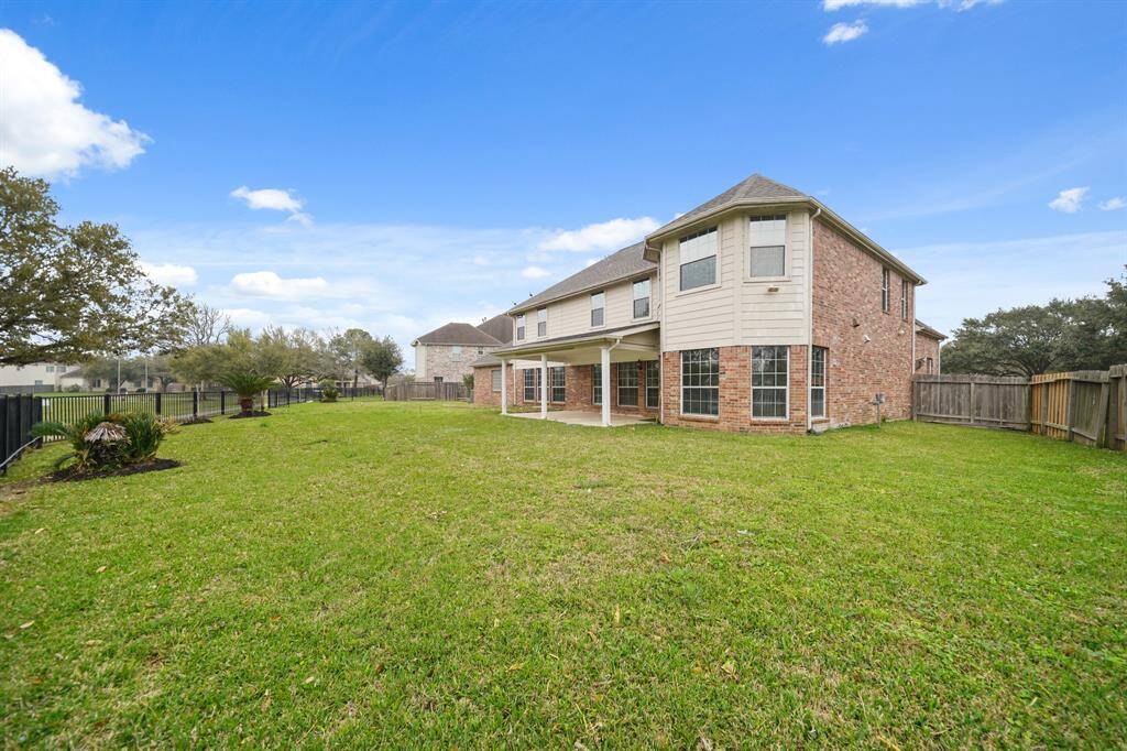 Take in the stunning lake view from your backyard, creating a peaceful and picturesque setting to unwind after a long day.