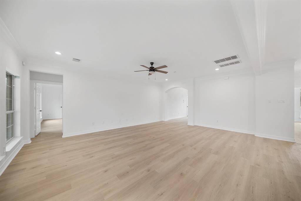 Beautifully designed flooring enhances the elegance and warmth of the room.