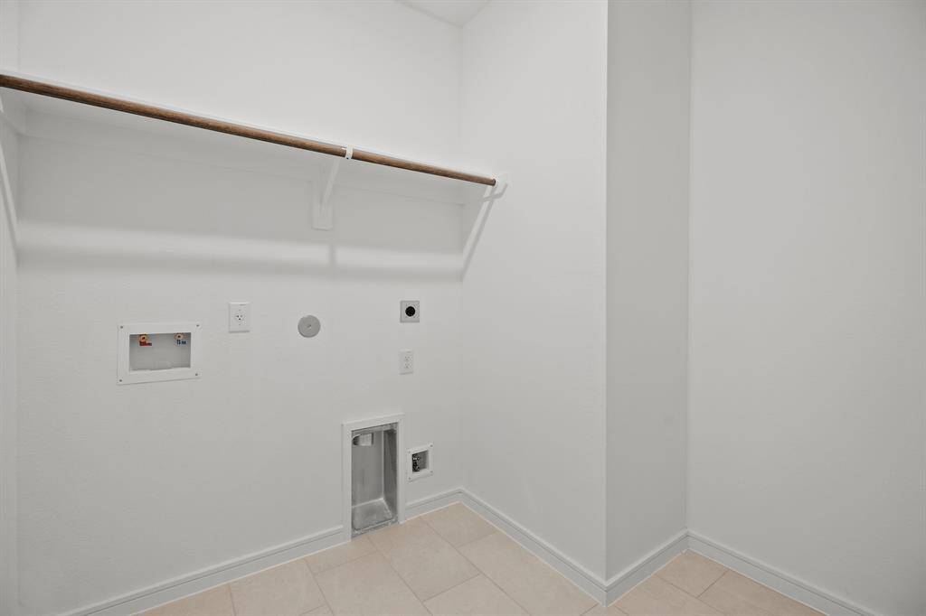 Laundry room (*Photo not of actual home and used for illustration purposes only.)