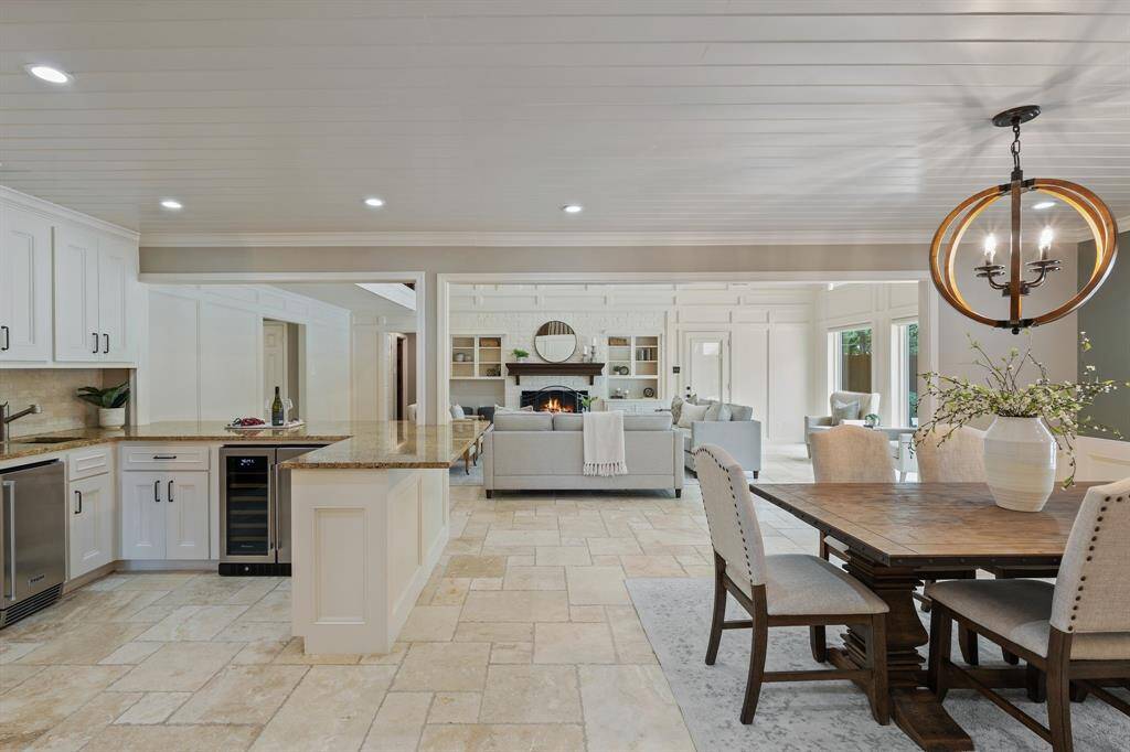 Notice the wet bar with separate ice maker and wine refrigerator!