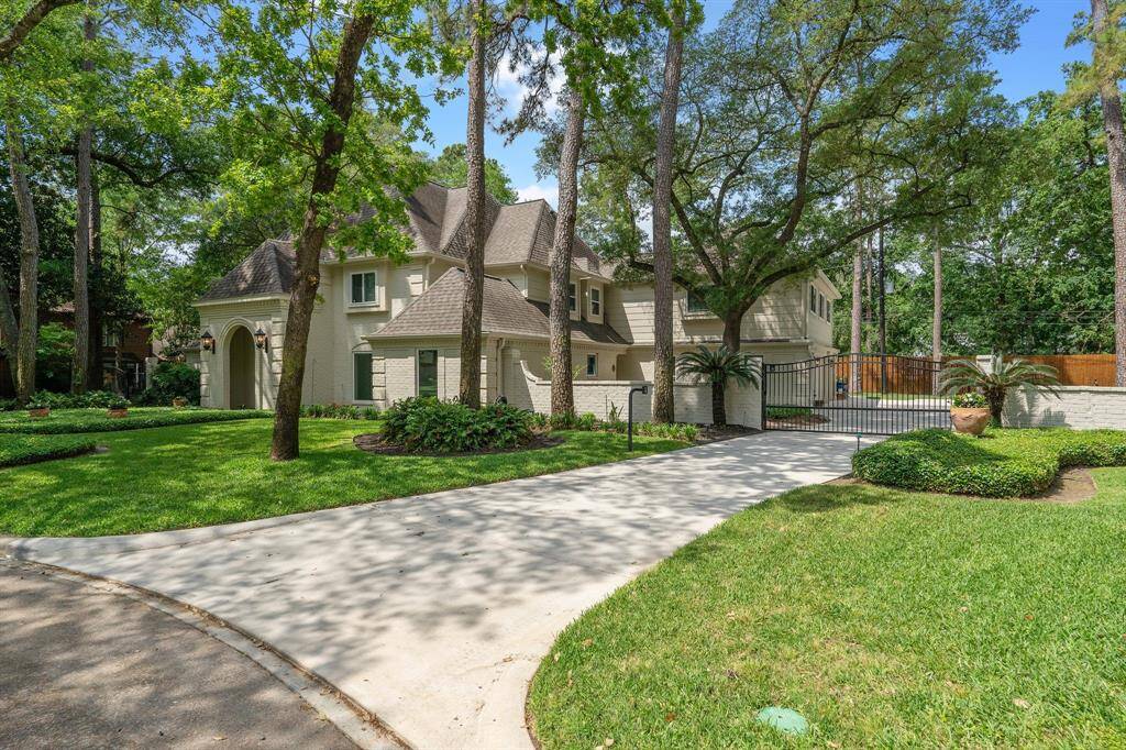 Long gated driveway entrance to your 3 car garage.
