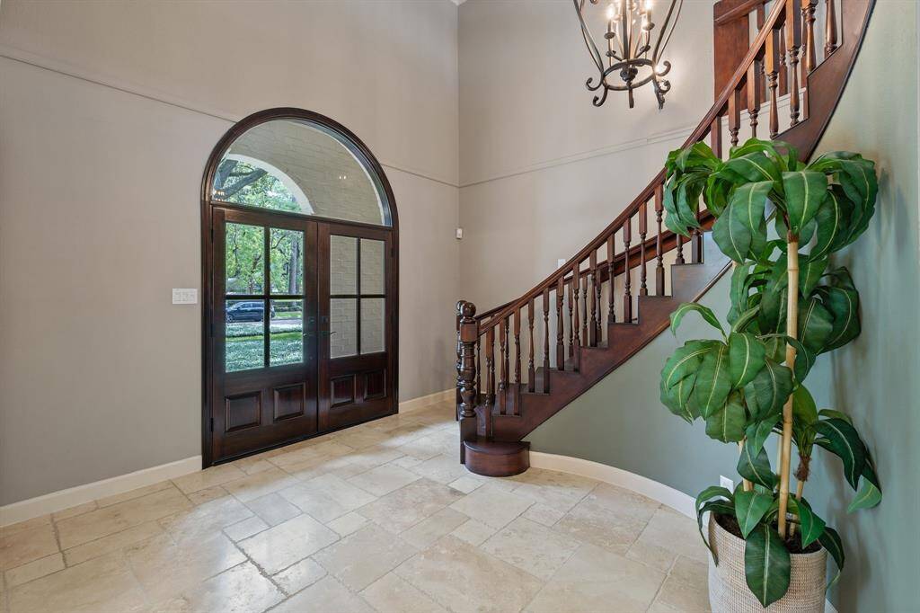 Beautiful arched double doors at your entry