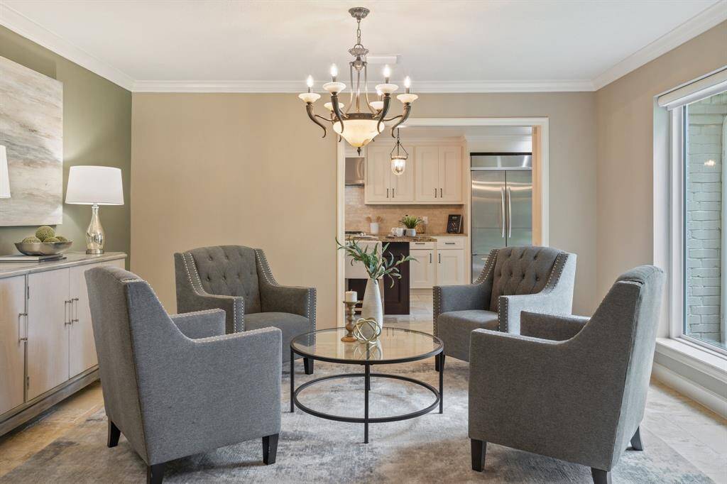 Front sitting area with beautiful chandelier.