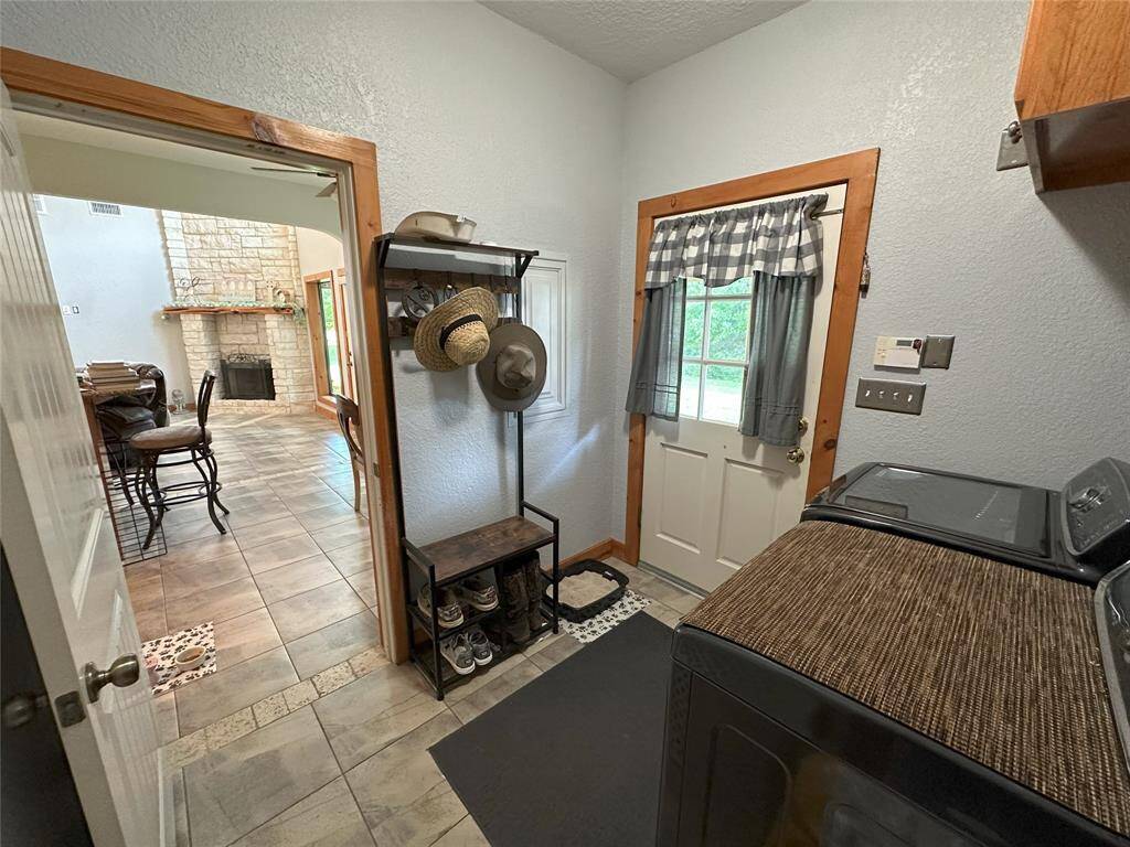 The Laundry/Mud Room is waiting right off the garage for ease and convience!