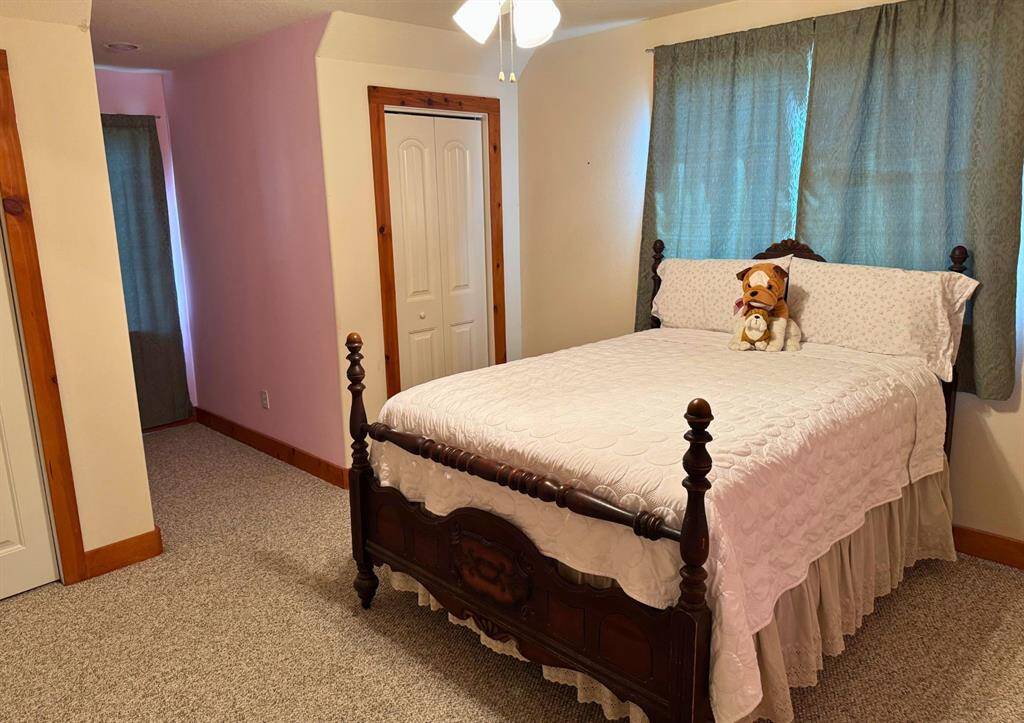 One of two secondary bedroom located upstairs.