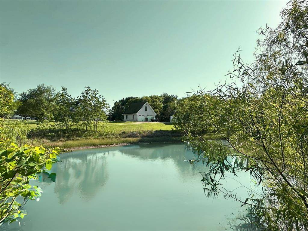 The beautiful pond on the property makes this property a perfect oasis.