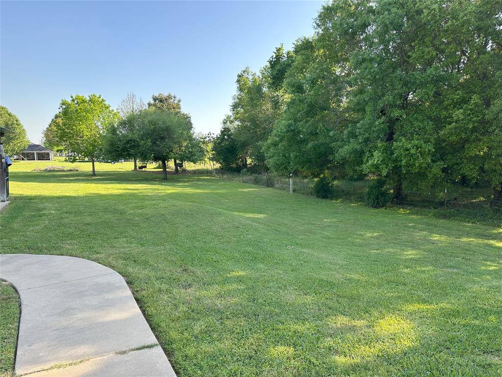 One of the many views from the beautiful backyard. Sit on your back porch and enjoy deer watching.