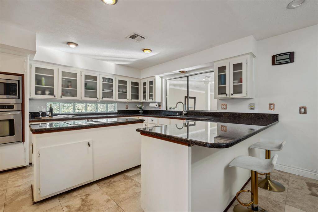 Tons of Counter Space topped with Timeless Granite, perfect for both everyday living and entertaining.