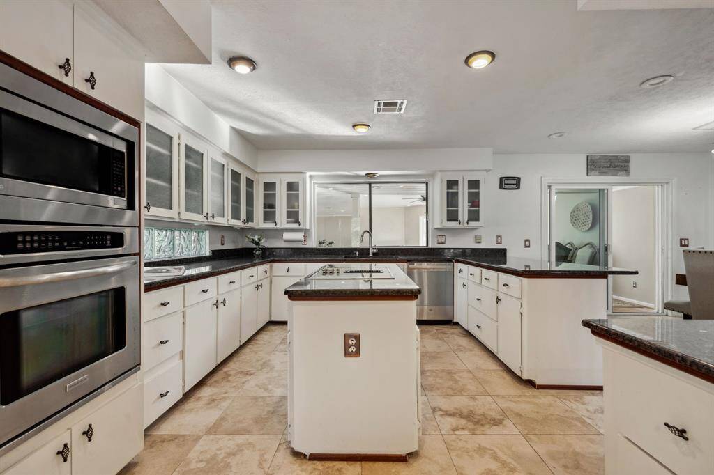 Abundant Cabinets Space with Built-in Appliances.