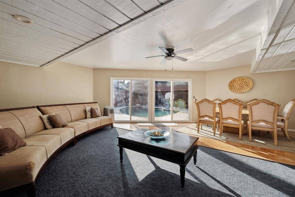 Bright and inviting sunroom with endless potential to create the perfect space for lounging, hosting, or enjoying year-round comfort.