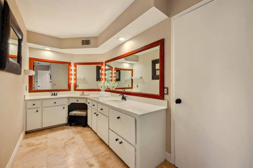 Elegant Primary Bathroom with Spacious Closet.