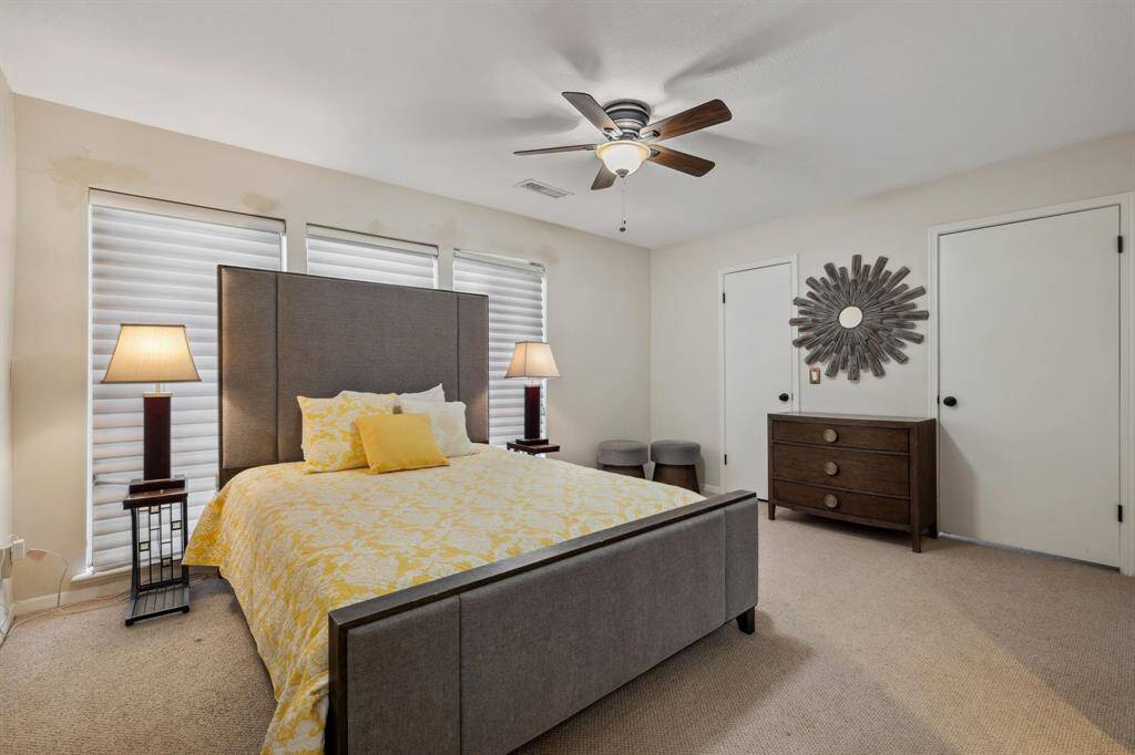 Bedroom 2 with two Closets and an Additional Flex Space currently used as study room.