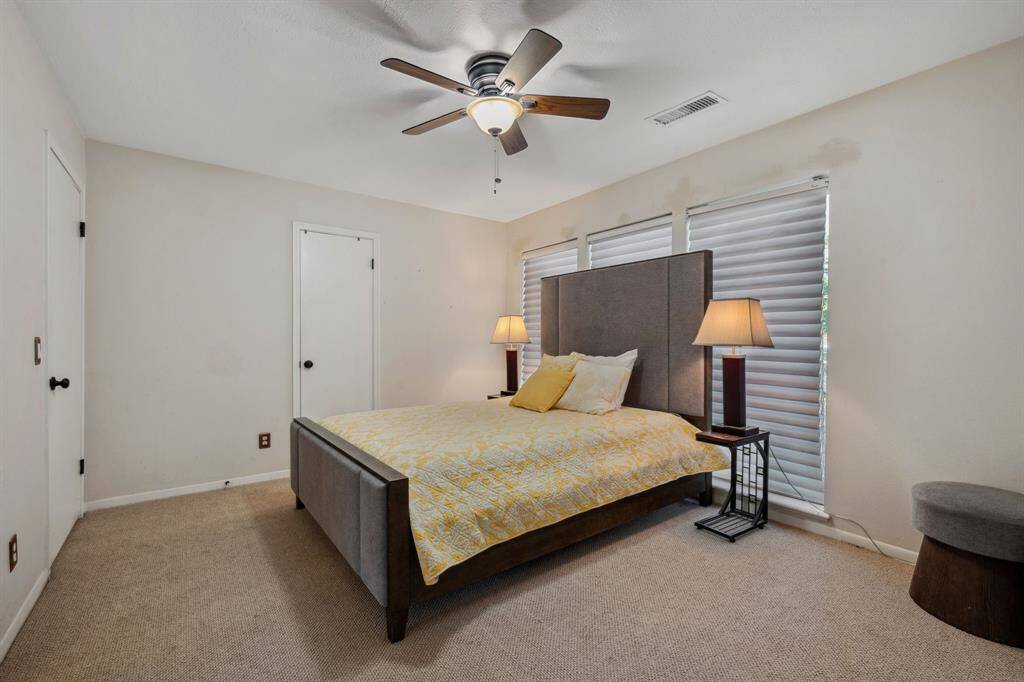 Bedroom 2 with two Closets and an Additional Flex Space currently used as study room.