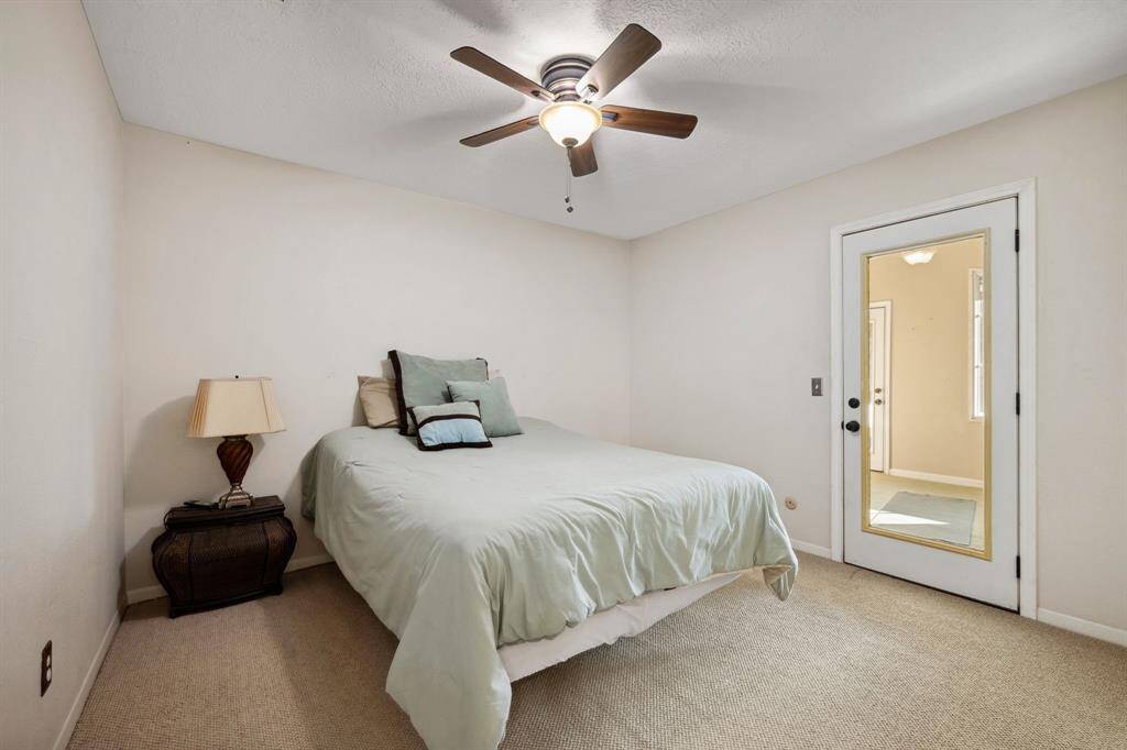 Bedroom 3 with spacious Closet, flex room currently used as Workout Room and access to the Balcony.
