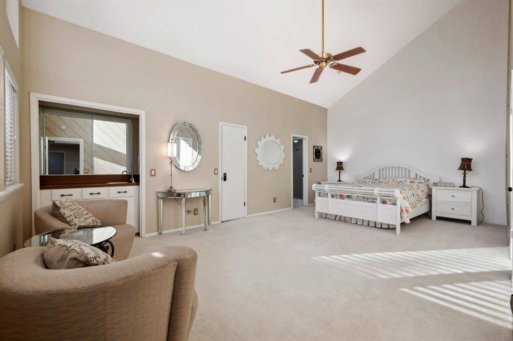 Bedroom 4 is a super spacious en suite featuring a private bathroom, sitting area, wet bar, and two generous closets.