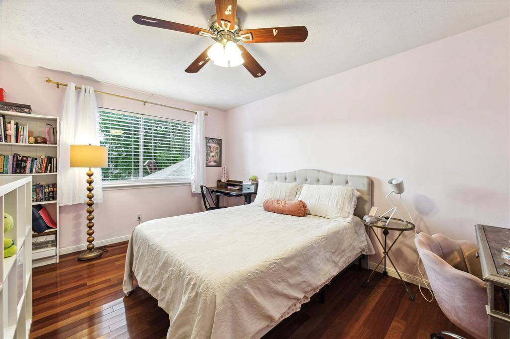 Bedroom 2 is large with hardwood floors, lots of natural light and a huge closet!