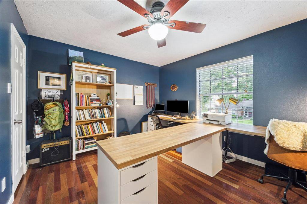 Bedroom 4 is currently used as an amazing office for two located at the top of the stairs. Desks are negotiable. Lots of natural light, hardwood floors and large closet!